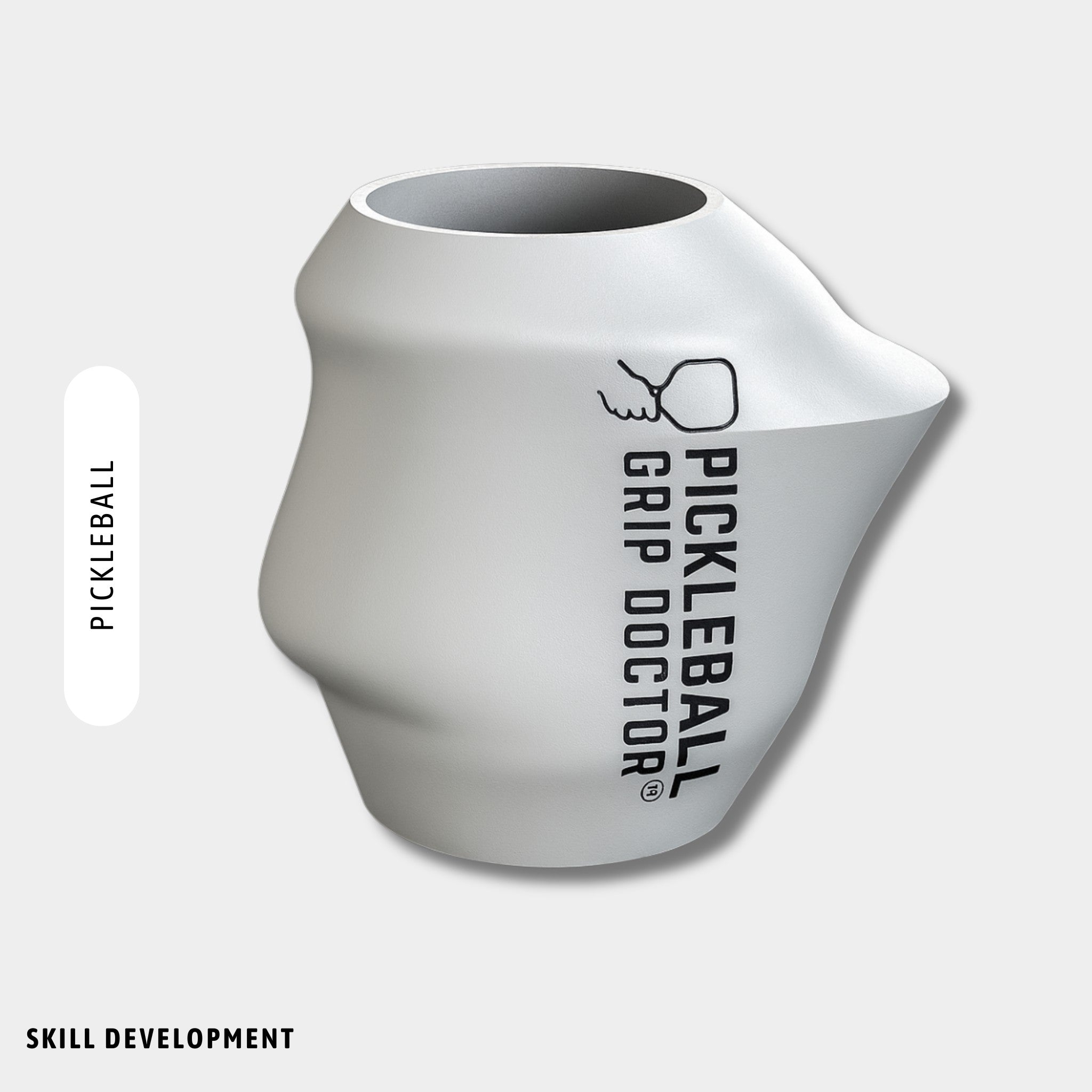 White pickleball grip device with 'Pickleball Grip Doctor' branding on a light gray background