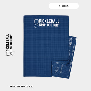 Blue towel with 'Pickleball Grip Doctor' branding on a white background