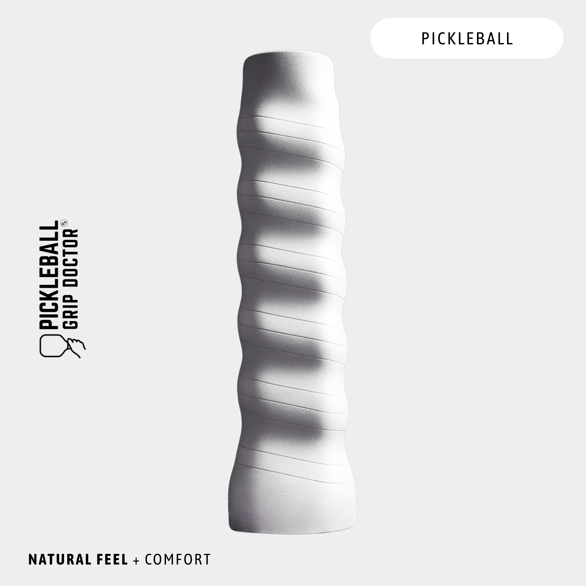 Silver pickleball grip with wavy texture on a white background, featuring 'Pickleball Grip Doctor' branding.