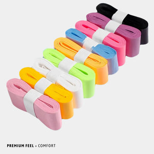 Set of colorful grips on a white background with 'Premium Feel + Comfort'