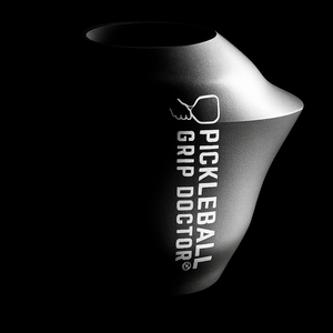 Pickleball grip device with 'Pickleball Grip Doctor' branding on a black background