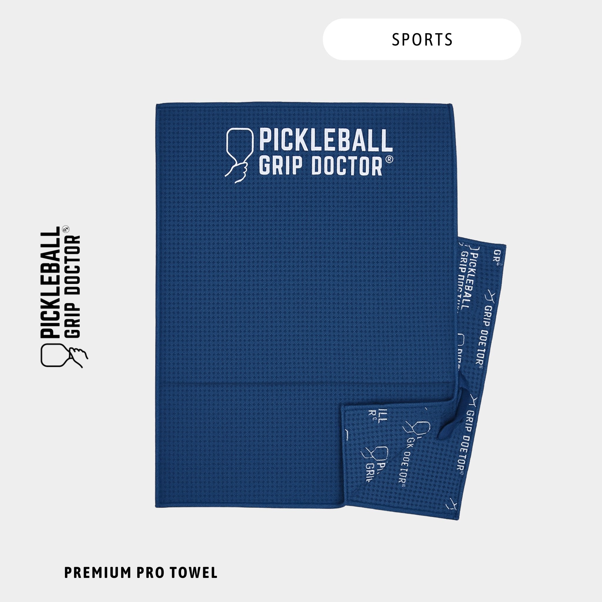 Blue towel with 'Pickleball Grip Doctor' branding on a white background
