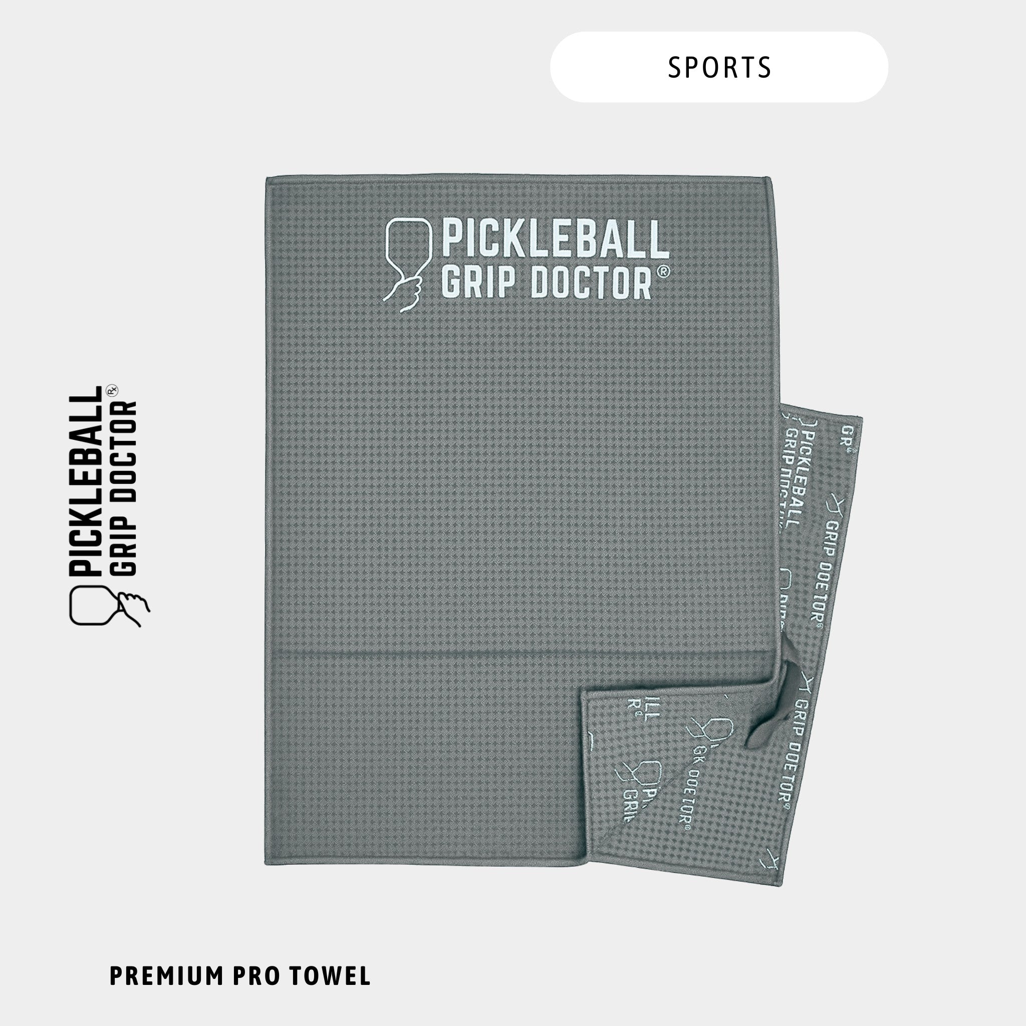 Gray towel with 'Pickleball Grip Doctor' branding on a white background