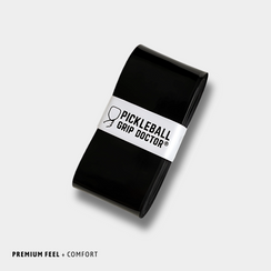 Black pickleball grip with 'Pickleball Grip Doctor' label on a light gray background